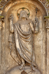 Historic Jesus on the mystery old Prague Cemetery, Czech Republic