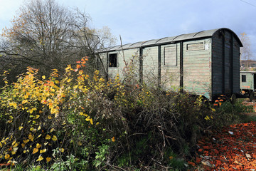 The ruined historical Train in the autumn Nature