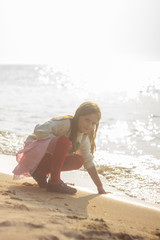 The little girl on the beach