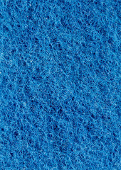 Fototapeta na wymiar Grain blue paint wall background or texture.