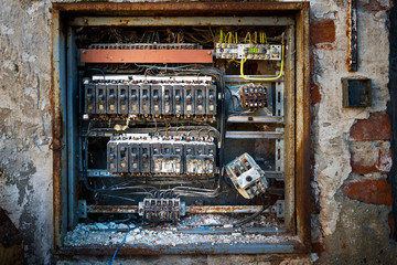 a detail of old broken circuit breakers