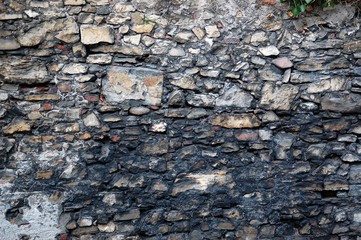 Closeup of the ancient stone wall texture
