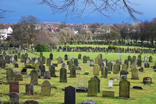 English old graveyard landscape in sunny day, green grass, park in Liverpool
