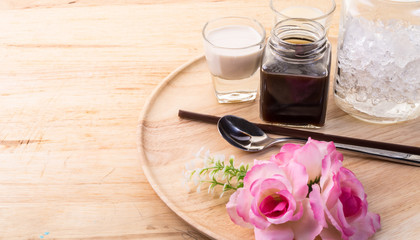 Obraz na płótnie Canvas Coffee-set with raw sugar and milk