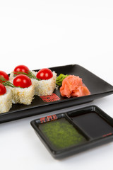 Image of tasty sushi set with salmon and tomato