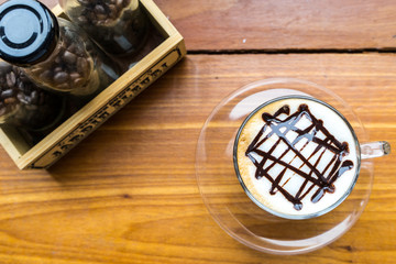 coffee cup on wooden table ,soft focus