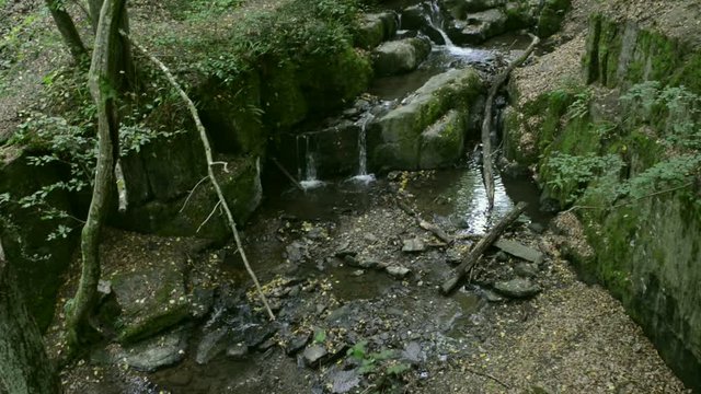 wild stream Brodenbach next to Mosel River. Waterfalls and stones. wild landscape. (Germany, Rhineland-palatinate) 