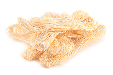 Egg noodles on a white background