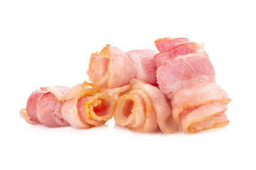 Cooked bacon rashers isolated on white