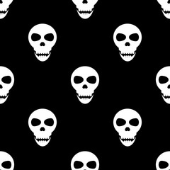 Seamless pattern with skulls on a black background