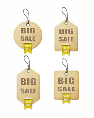 set of big sale paper labels with yellow ribbon