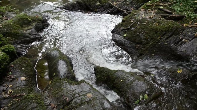 wild stream Brodenbach next to Mosel River. Waterfalls and stones. wild landscape. (Germany, Rhineland-palatinate) 