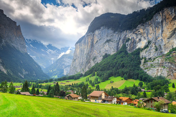 Spectacular Lauterbrunnen town with high cliffs,Bernese Oberland,Switzerland,Europe