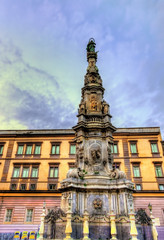 Fototapeta na wymiar The obelisk of the Immaculate Virgin in Naples