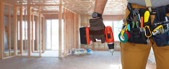 Builder handyman with drill.