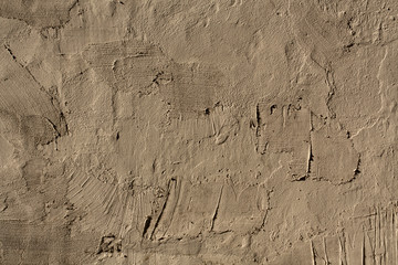 Abstract beige cement wall texture.