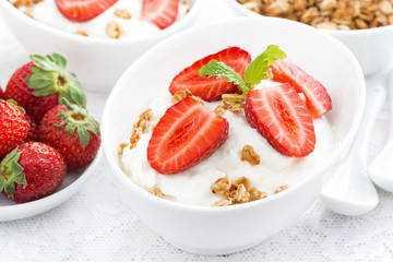 whipped cream with fresh strawberries and granola, close-up