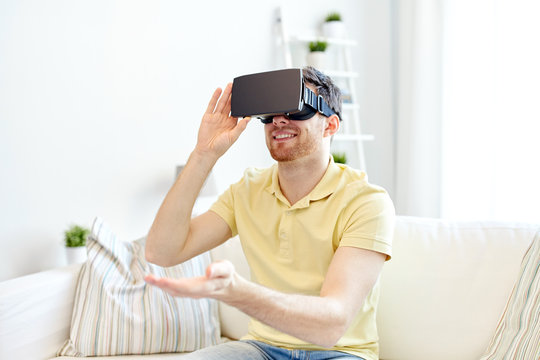 young man in virtual reality headset or 3d glasses