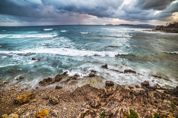 Fototapeta na wymiar Alghero coastline under a dramatic sky