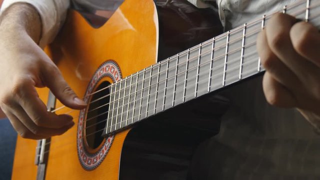 Playing classic spanish guitar