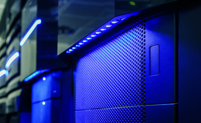 Panel mainframe closeup blue blur server room