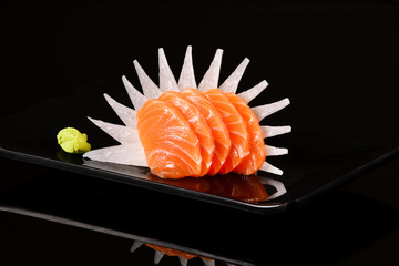 Fan out salmon sashimi slices