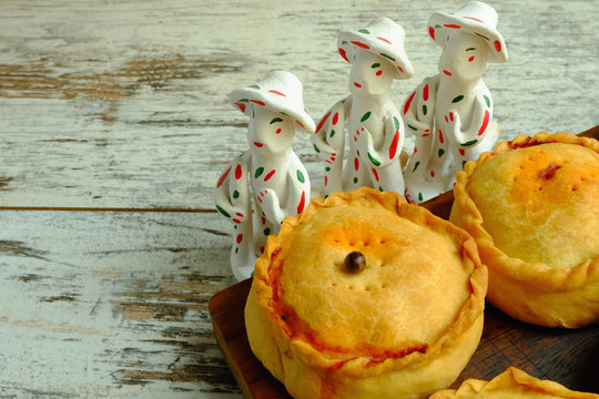Typical majorcan pork and peas pies with Siurell (traditional clay figure in Majorca)
