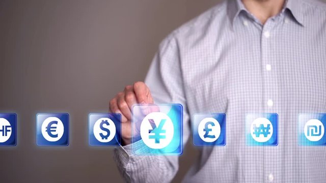 Businessman touch Yen or Yuan icons