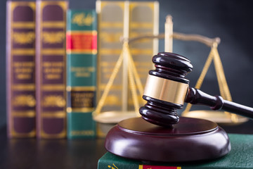 Wooden Judges gavel ,golden scales justice