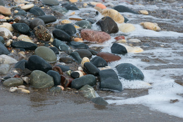 Obraz premium pebble stones and waves