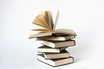A stack of books lying on a white background, learning, education, study