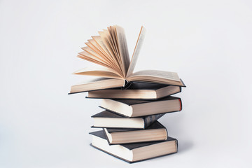 A stack of books lying on a white background, learning, education, study