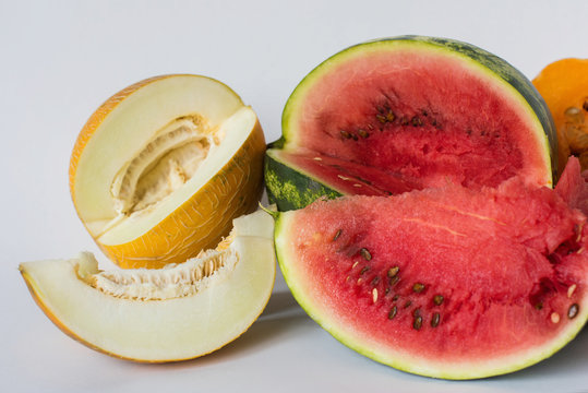 Melon, watermelon and pumpkin sliced on a white background, vegetarian food, fruits, vegetables, organic, healthy lifestyle