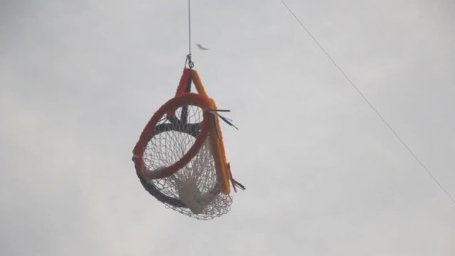 Hoop Takraw, basket-shaped net