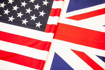 Flags of USA and United Kingdom. Two state flag folded in half.