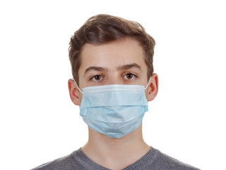 Cute sick boy in a mask