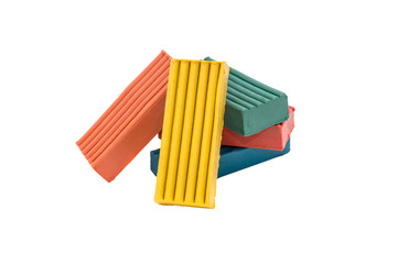 Pile of colorful children's plasticine isolate on white