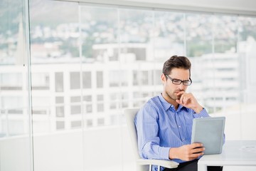 Businessman using digital tablet