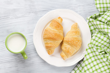 Fresh croissants and milk