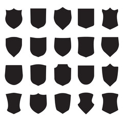 Shield icons set. Different black shield shapes isolated on white background. Vector illustration.