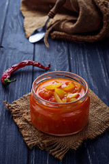 Pickled bulgarian peppers  in a glass jar