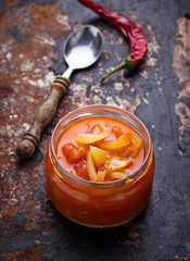 Pickled bulgarian peppers  in a glass jar