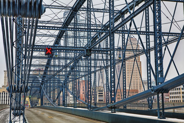 Colorful bridge with Pittsburgh, PA, skyline
