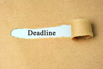 Torn paper with "deadline" word.