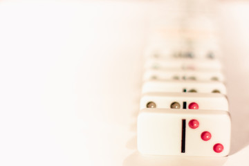 Fototapeta na wymiar .dominoes with colored dots , isolated on white background