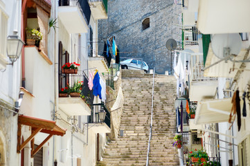 Fototapeta premium Typical medieval narrow street in beautiful town of Vieste