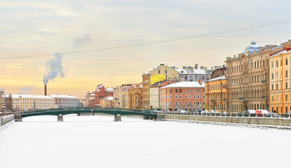 Embankment of the Fontanka River and Egyptian bridge on a winter evening. St. Petersburg, Russia
