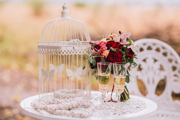 Bouquet of flowers lying on a stone table. outdoors.
