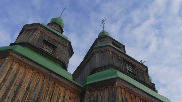 Wooden Church Green Roofs on a Bell Towers Windows Blue Sky Church of Paraskeva the Holy Martyr in Pirogovo Ukrainian Sacral Architecture Baroque Style
