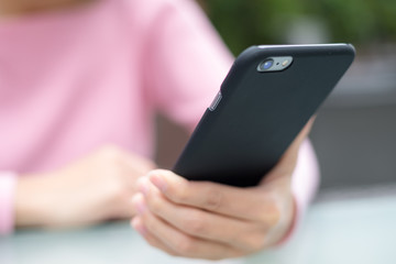 Woman pay with cellphone